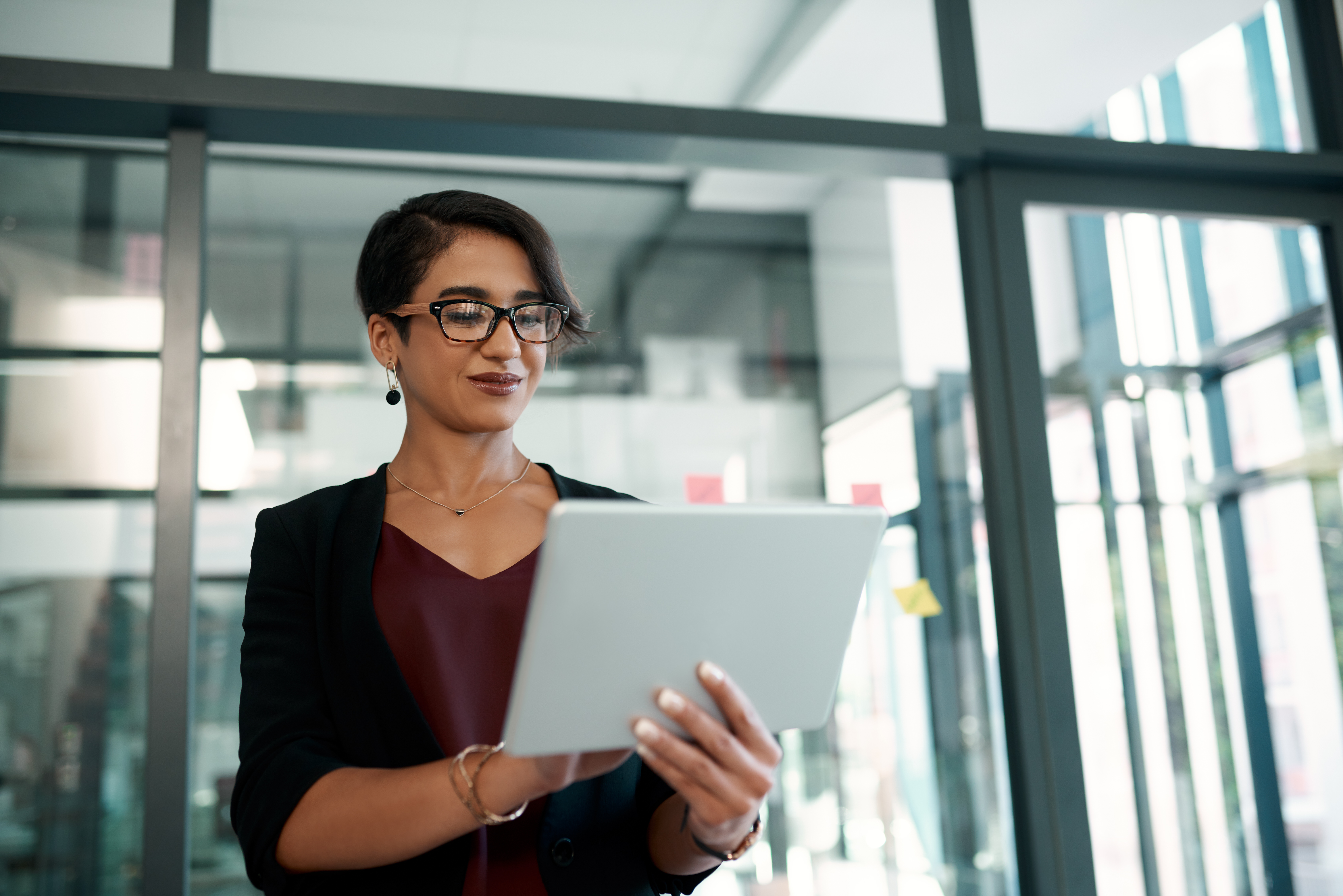 Women Checking Condo Association Insurance
