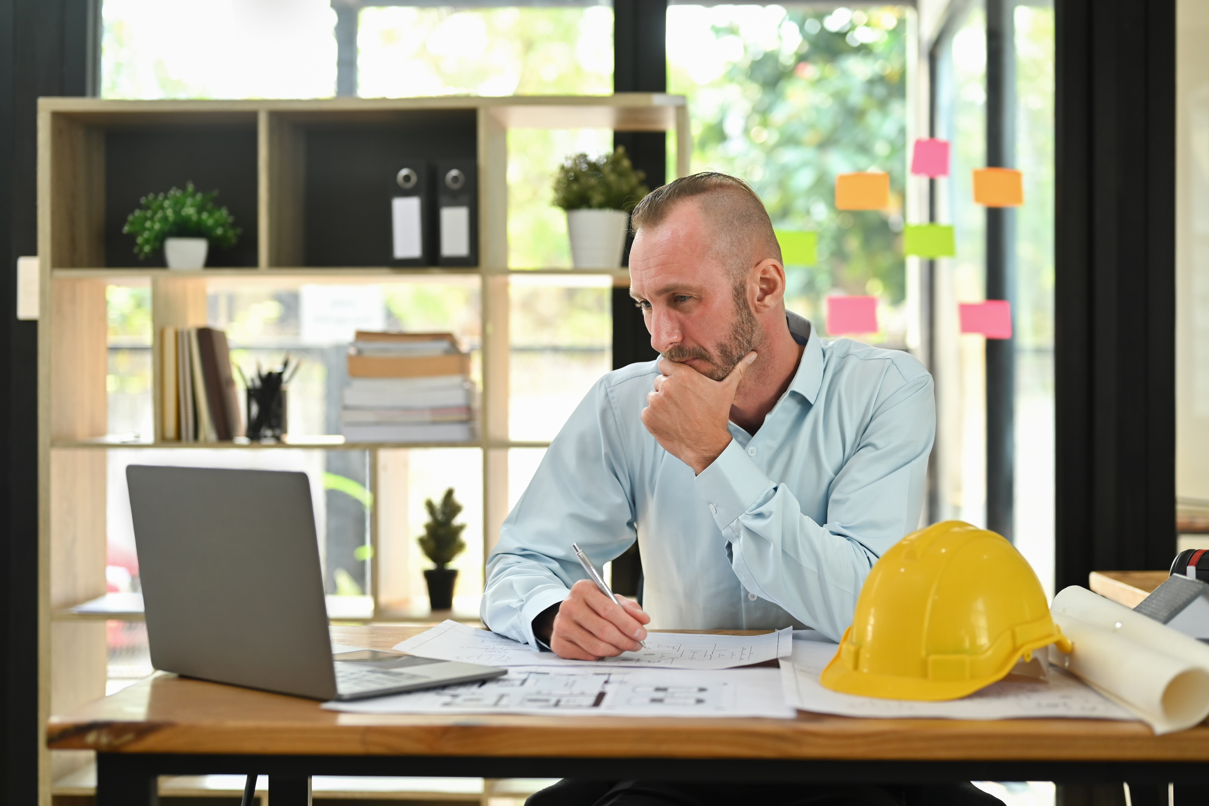 Focused engineer man watching online webinar training