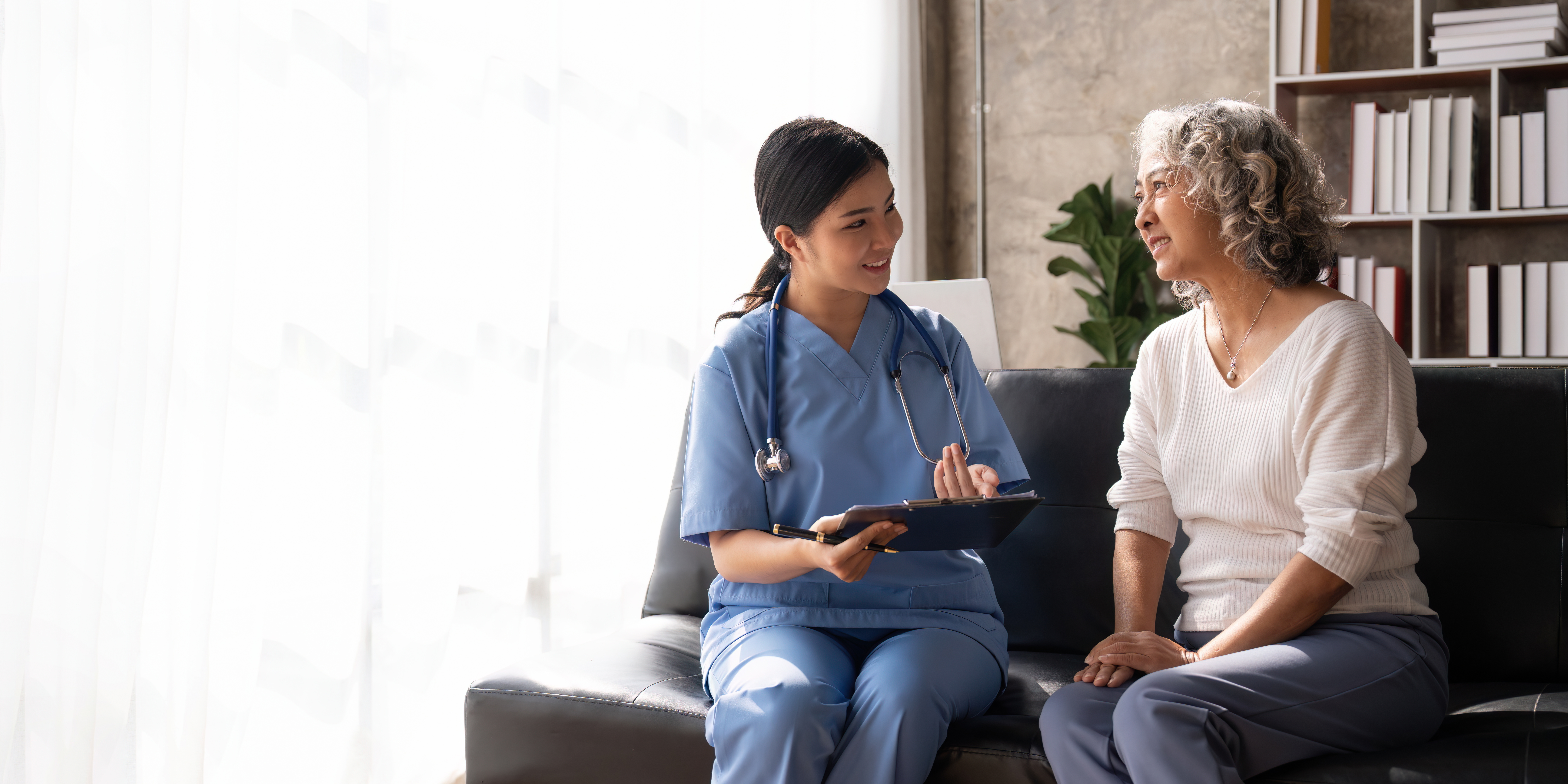 Doctor consults with an older patient