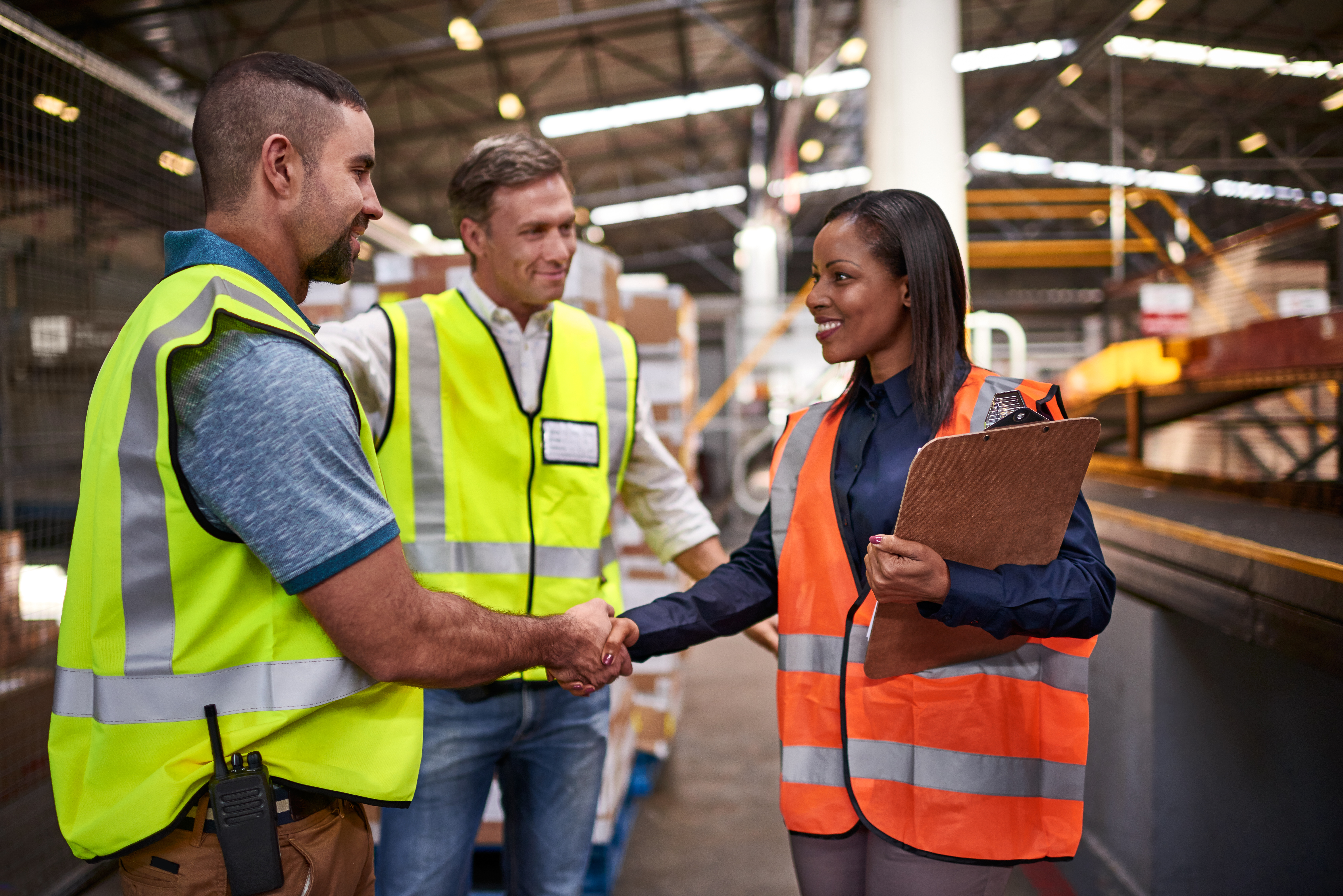 Workers shaking hands
