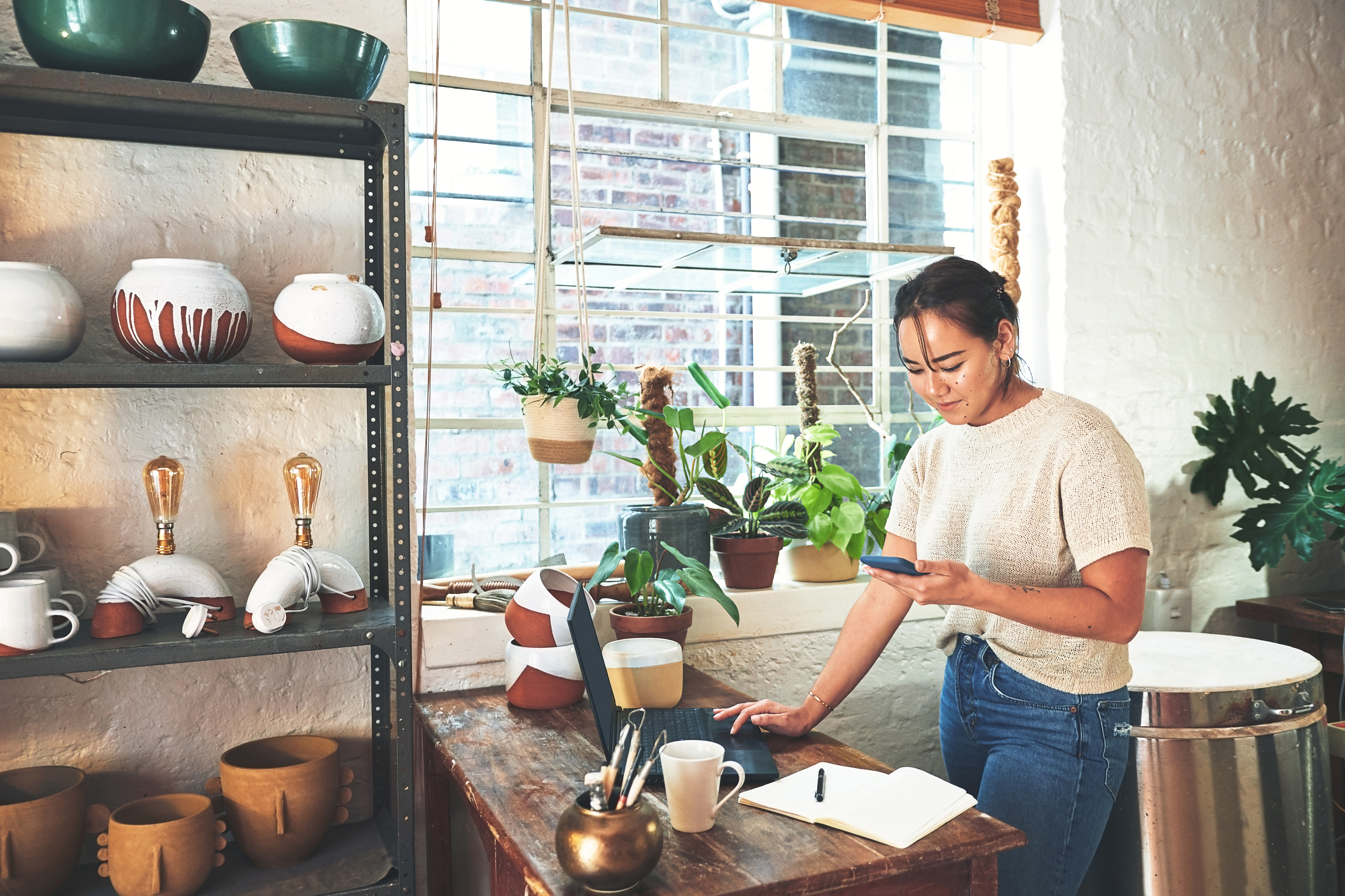 Small business owner viewing her COI on a phone