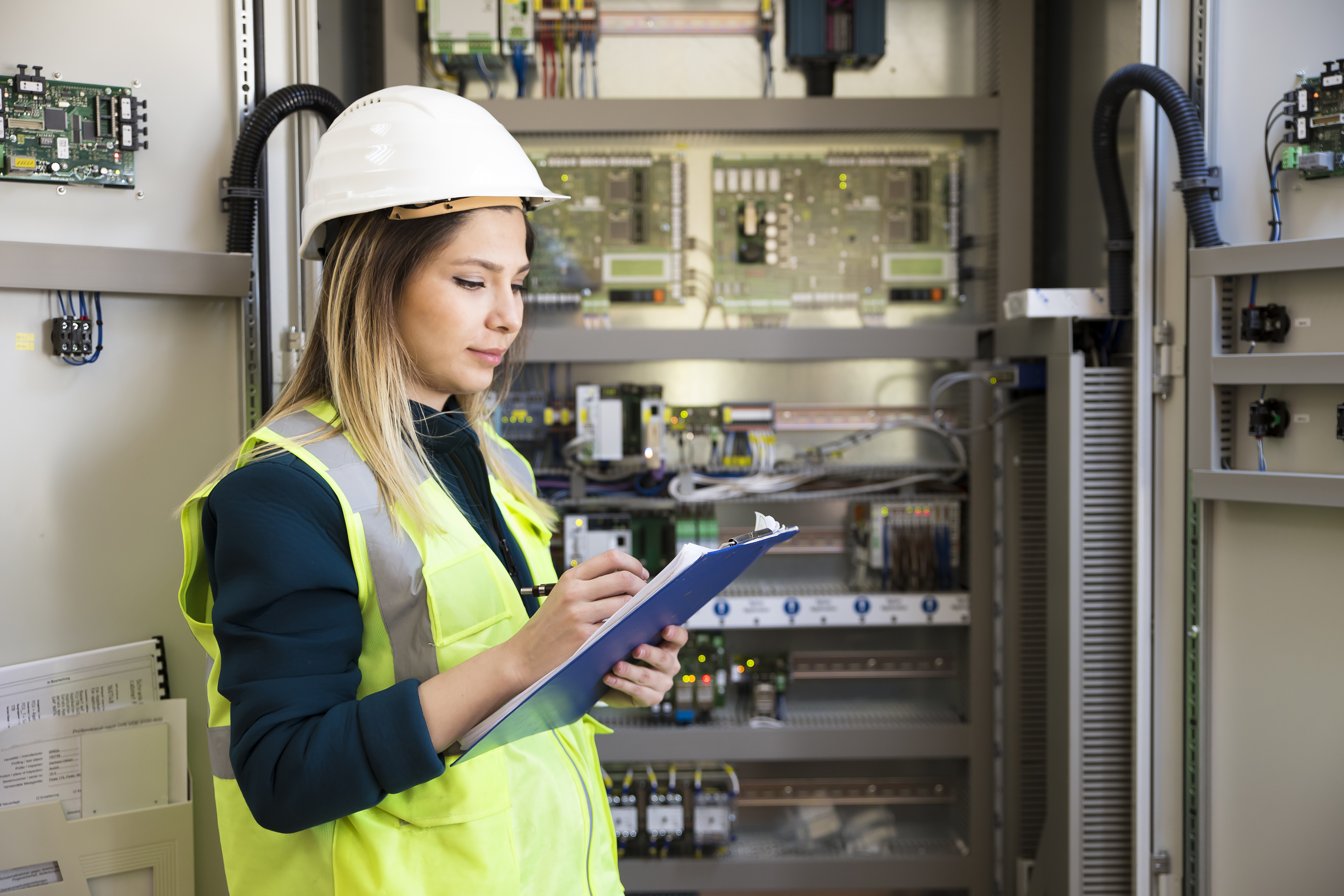 Electrician with insurance and clipboard